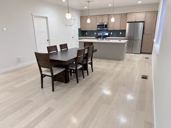 Kitchen and dining area cleaned for a ready-to-use space